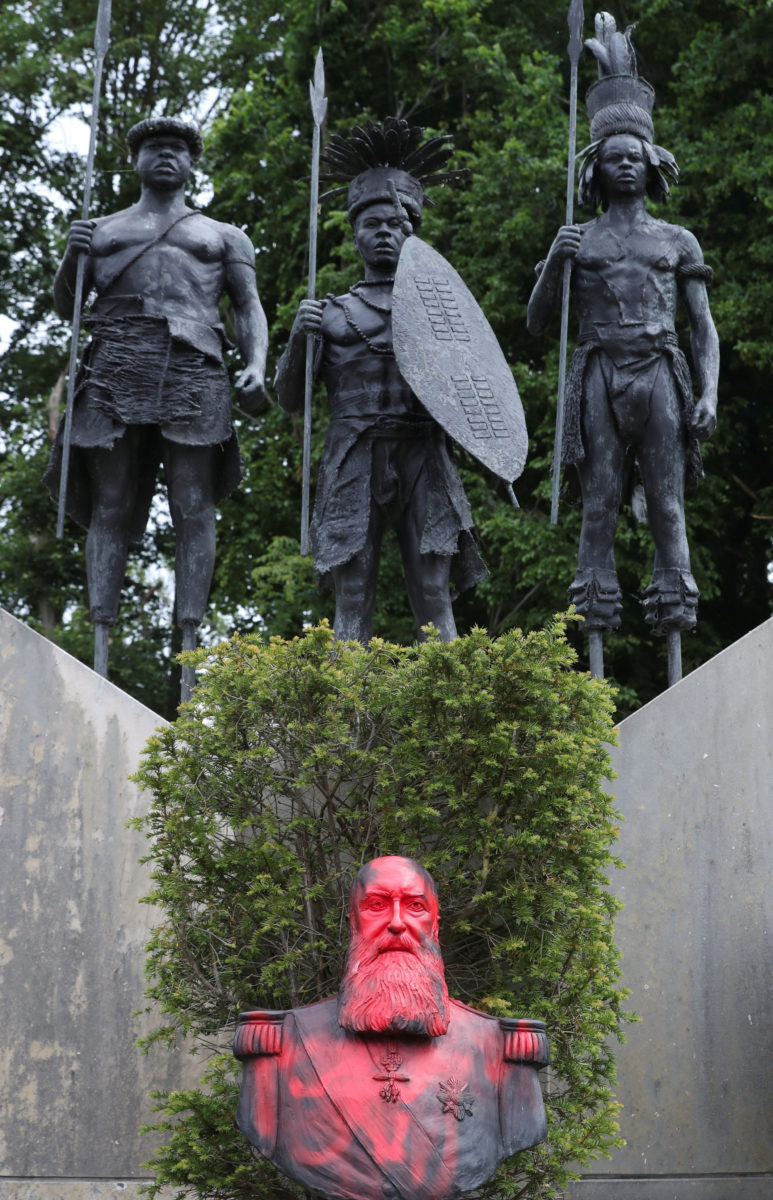 A statue of Leopold II vandalized in the garden of the Museum of Africa 