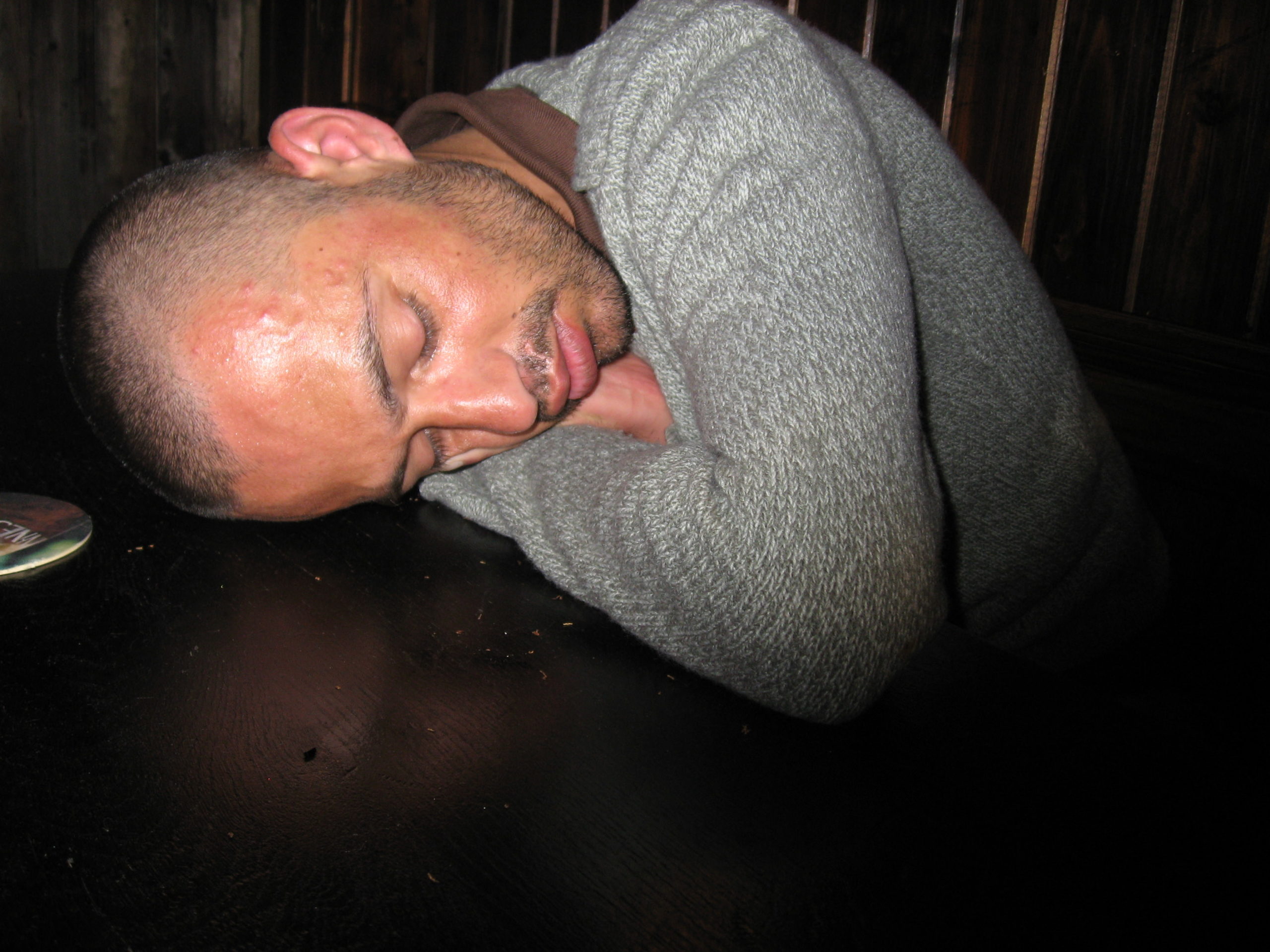 Sleeping on a table in Celtica pub drunk Brussels